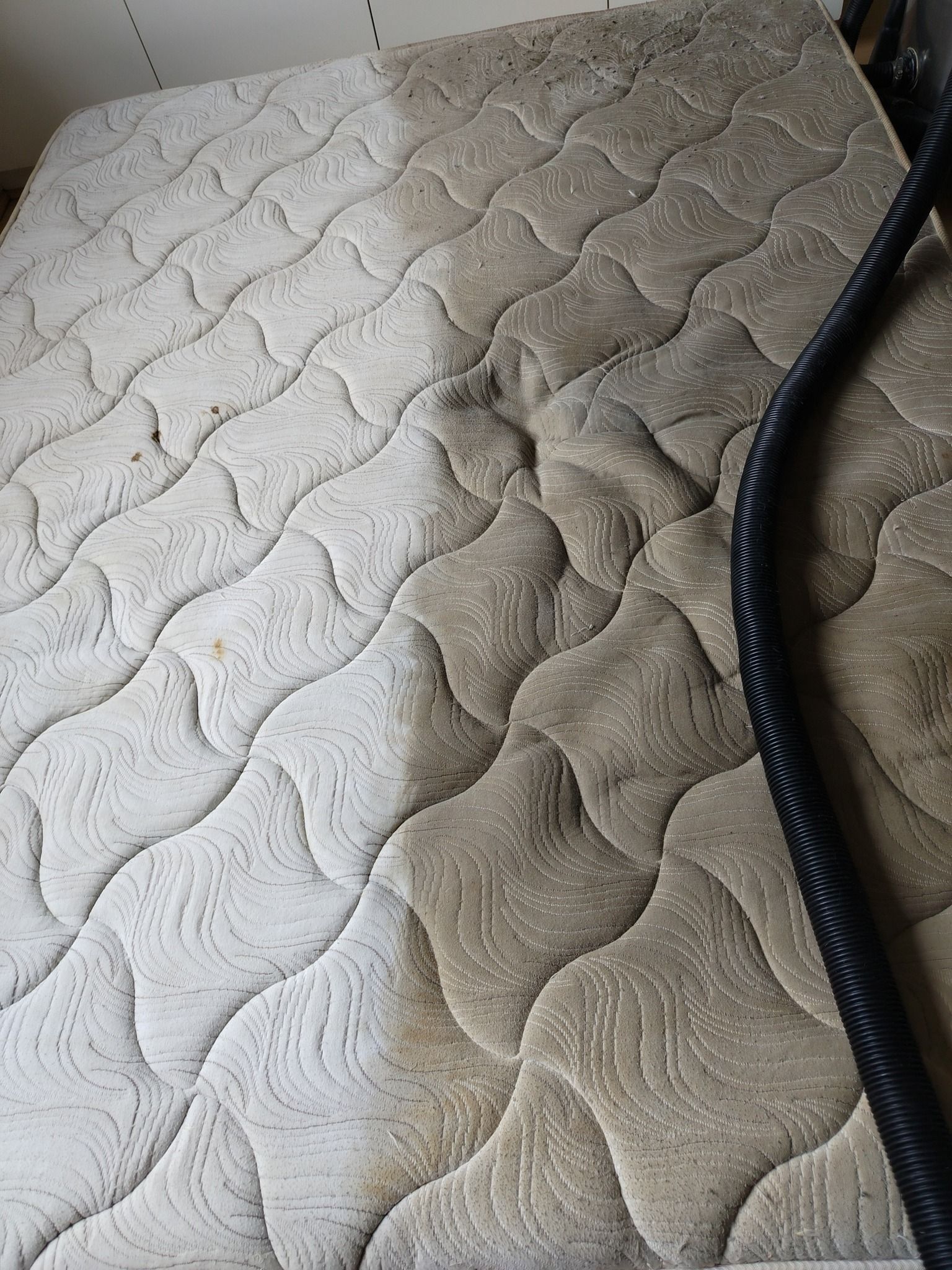 Mattress before and after being cleaned